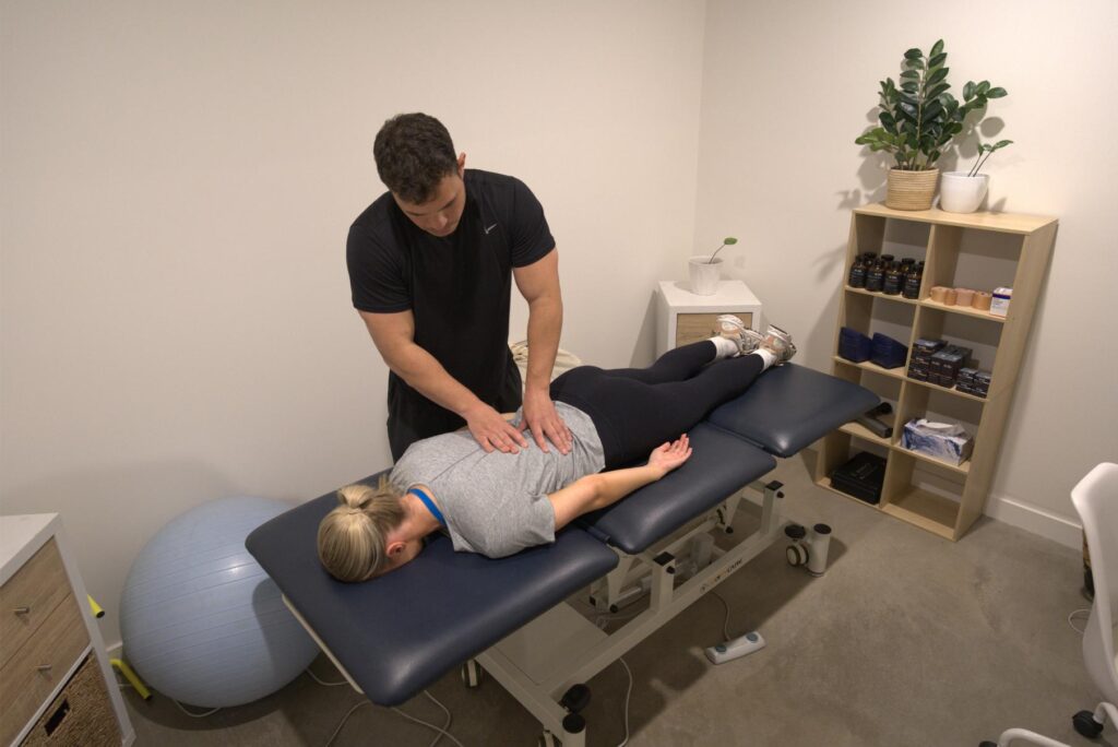 Yannick Chani providing hands-on treatment at Peak Motion Mornington