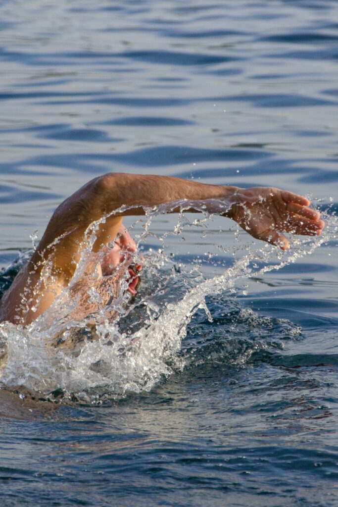 Swimmer in open water, shoulder physiotherapy Mornington